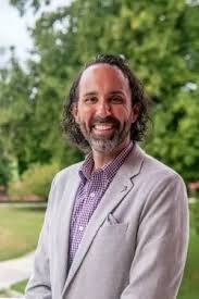 Headshot of Nathan and Albert